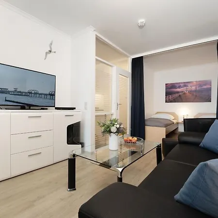 Апартаменты Strandappartements Am Leuchtturmweg Sonnenschein